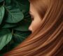 woman with long straight hair green leaves background min 90x80